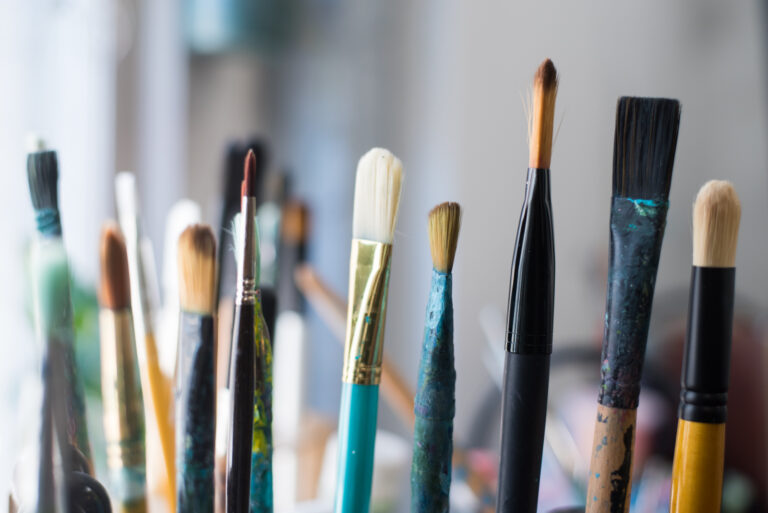 Photo of paintbrushes in Adriana Ameigh Art Studio